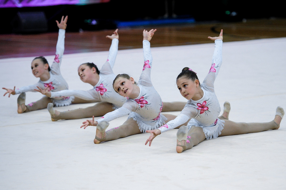 Group of rhythmic gymnasts performing