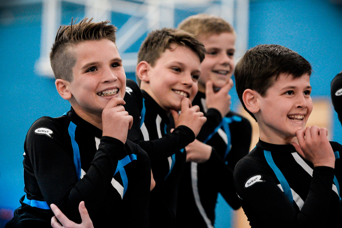 Performing in front of crowds, young TeamGym gymnast lads